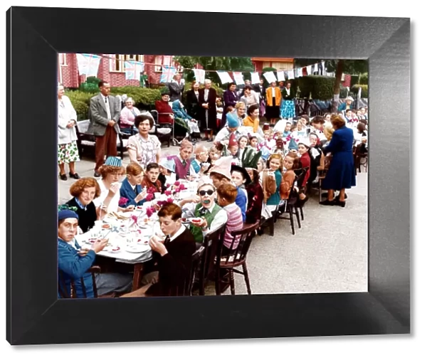 Coronation - children having a street party to celebrate. Norfolk Crescent, Sidcup photographer