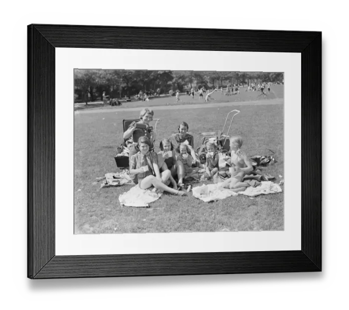 Framed Print : Day trippers have come to the promenade in Gravesend, Kent, to enjoy the sunny weather