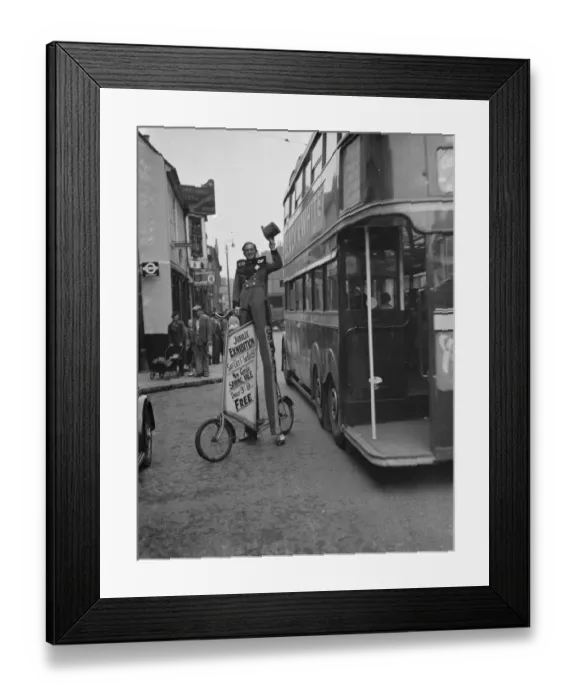 Framed Print : Stunt cyclist Tom Longley demonstrates his skills just outside the Dartford Co op, Kent Framed Print : Stunt cyclist Tom Longley demonstrates his skills just outside the Dartford Co op, Kent