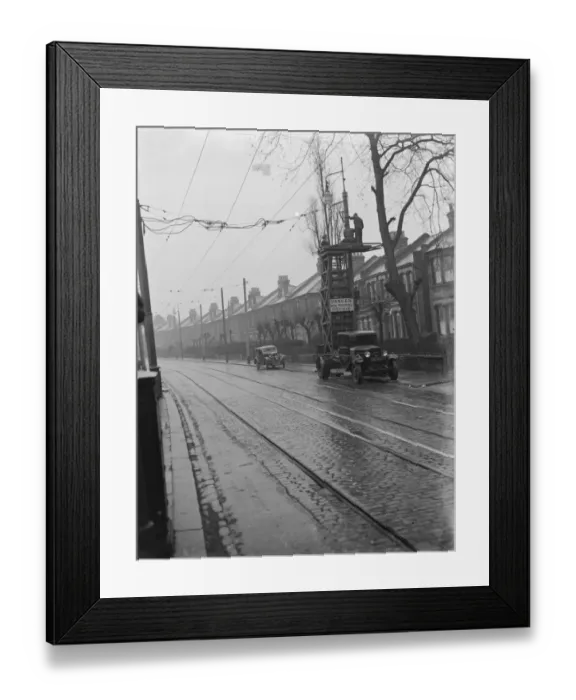 Framed Print : Workers from the Demolition and Construction Company Ltd use their Bedford Tram Tower Framed Print : Workers from the Demolition and Construction Company Ltd use their Bedford Tram Tower