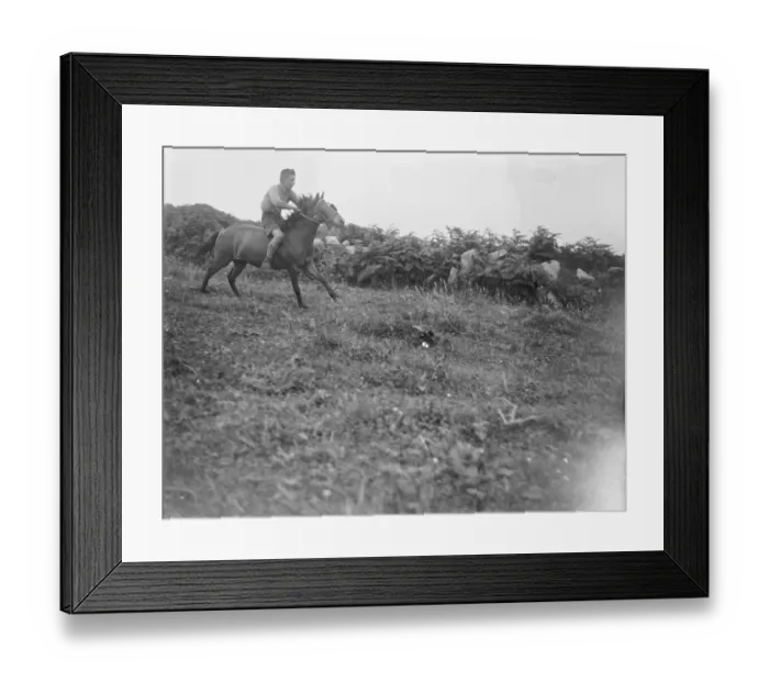 Framed Print : A boy riding a horse, bareback, galloping on a field. 1933 Framed Print : A boy riding a horse, bareback, galloping on a field. 1933