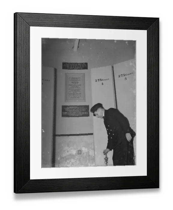 Framed Print : Lighthouse keeper at Dungeness lighthouse in Kent, checks the oil tanks Framed Print : Lighthouse keeper at Dungeness lighthouse in Kent, checks the oil tanks