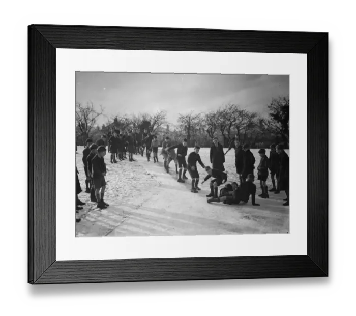 Framed Print : Schoolboys sliding on the snow on a path in Orpington, Kent. 1937 Framed Print : Schoolboys sliding on the snow on a path in Orpington, Kent. 1937