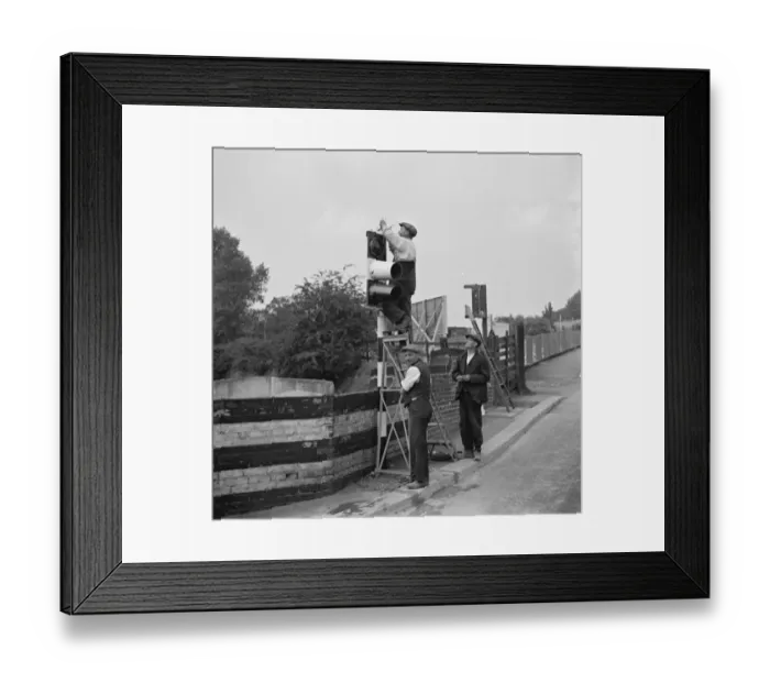 Framed Print : Workmen work on traffic lights in Swanley. 1936 Framed Print : Workmen work on traffic lights in Swanley. 1936