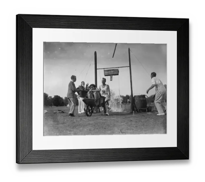 Framed Print : The tlting bucket at a sports day 1935 Framed Print : The tlting bucket at a sports day 1935