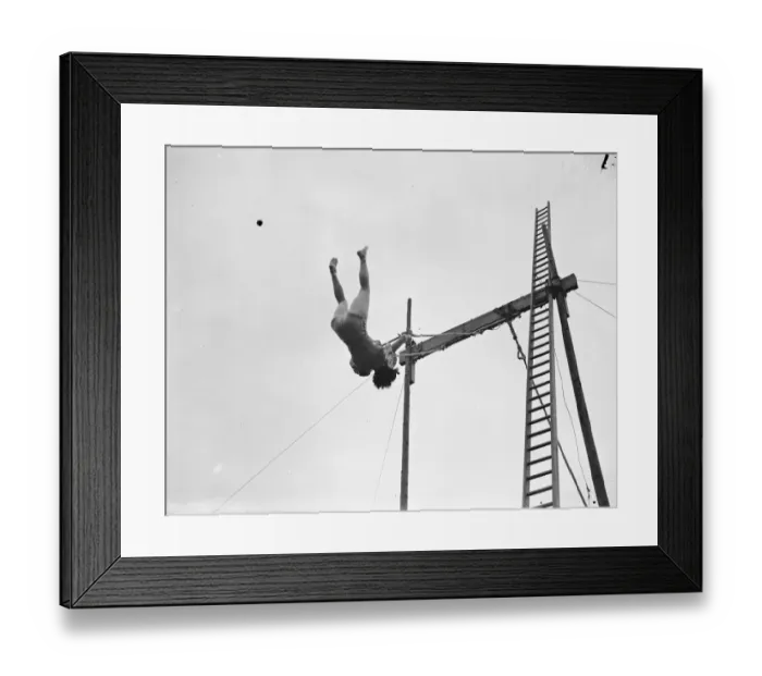 Framed Print : A trapeze artist performing at the Sidcup fete in Kent. 1939 Framed Print : A trapeze artist performing at the Sidcup fete in Kent. 1939
