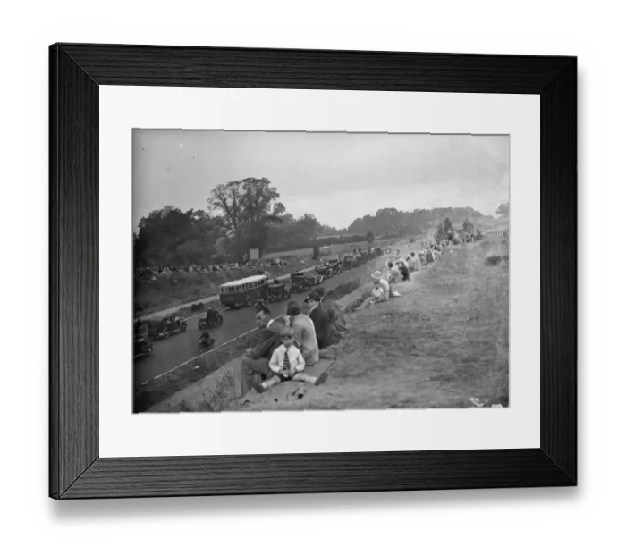 Framed Print : Crowds watching the traffic on the newly opened Sicup by - pass. The road greatly Framed Print : Crowds watching the traffic on the newly opened Sicup by - pass. The road greatly