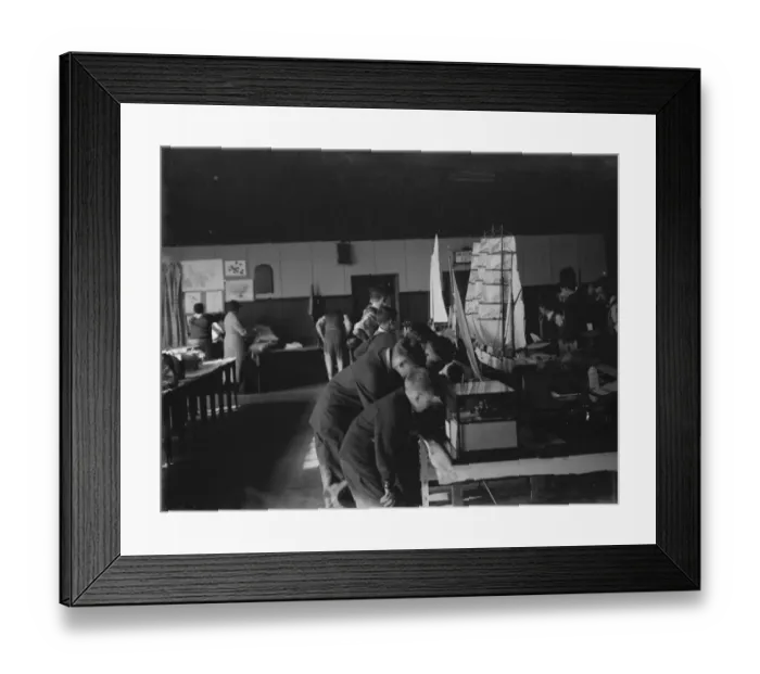 Framed Print : Boys examine a model sailing ship at the handicraft exhibition in Dartford, Kent Framed Print : Boys examine a model sailing ship at the handicraft exhibition in Dartford, Kent
