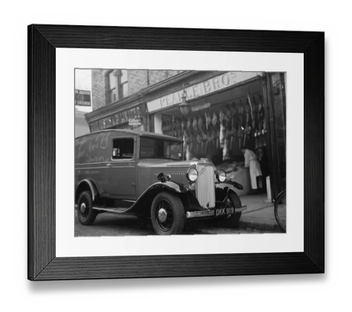 Framed Print : A Bedford truck belonging to Pearce Bros Ltd, the fishmongers and poulterers, parked Framed Print : A Bedford truck belonging to Pearce Bros Ltd, the fishmongers and poulterers, parked