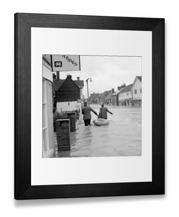 Framed Print : Householders salvaging what belongings they can - at the Southern end of High Street Edenbridge Kent on Sunday evening. 11 September 1968 Framed Print : Householders salvaging what belongings they can - at the Southern end of High Street Edenbridge Kent on Sunday evening. 11 September 1968