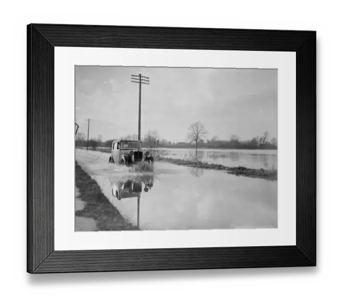 Framed Print : A car risks the floods in Yalding, Kent. 1936