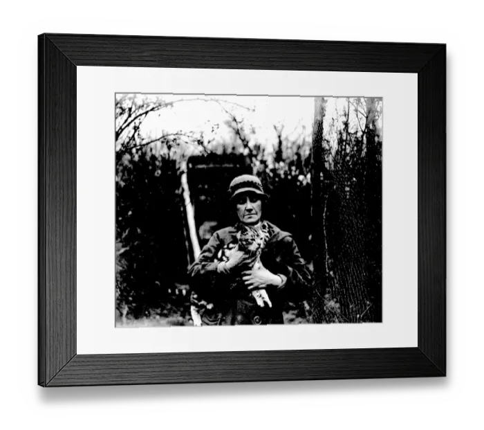 Framed Print : Miss Nancy Rutherford holding one of her many cats. (Otford) 1934