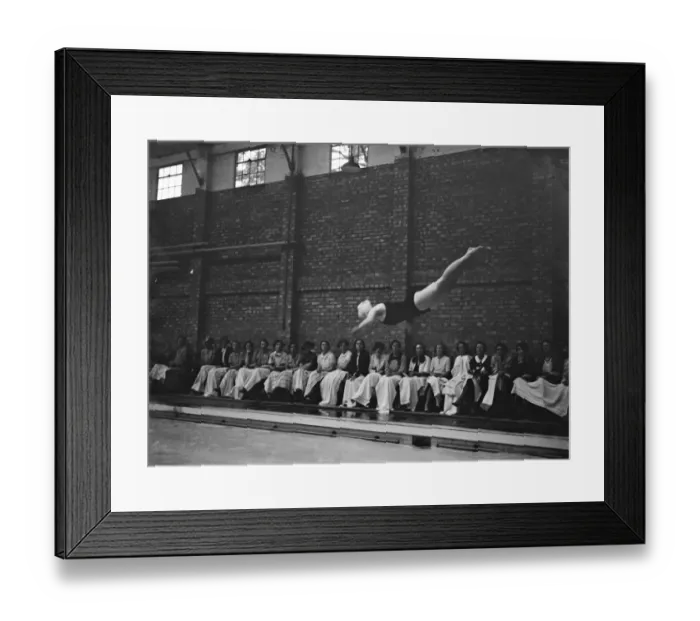 Framed Print : Bergman Osterberg College of Physical Education in Darford, Kent. One girl dives Framed Print : Bergman Osterberg College of Physical Education in Darford, Kent. One girl dives