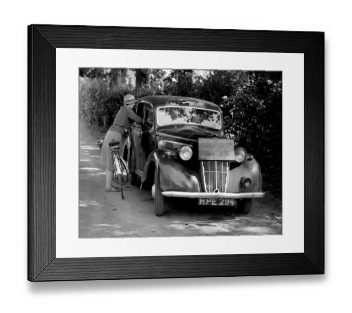 Framed Print : Mobile Office for Collecting Electricity Dues A car is used as a mobile office for