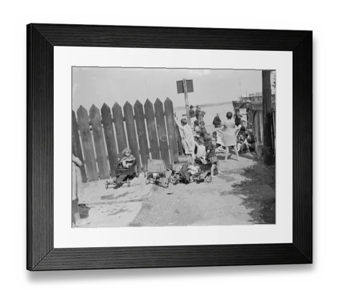 Framed Print : Children have come to the riverside on the Thames estuary at Gravesend, Kent, to Framed Print : Children have come to the riverside on the Thames estuary at Gravesend, Kent, to