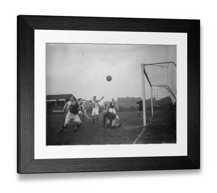 Framed Print : Erith and Belvedere club versus Worthing football club. The keeper looks on as Framed Print : Erith and Belvedere club versus Worthing football club. The keeper looks on as