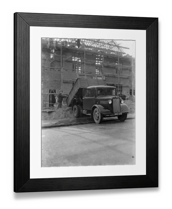 Framed Print : A Bedford truck tipping its load at a building site in Chislehurst, Kent