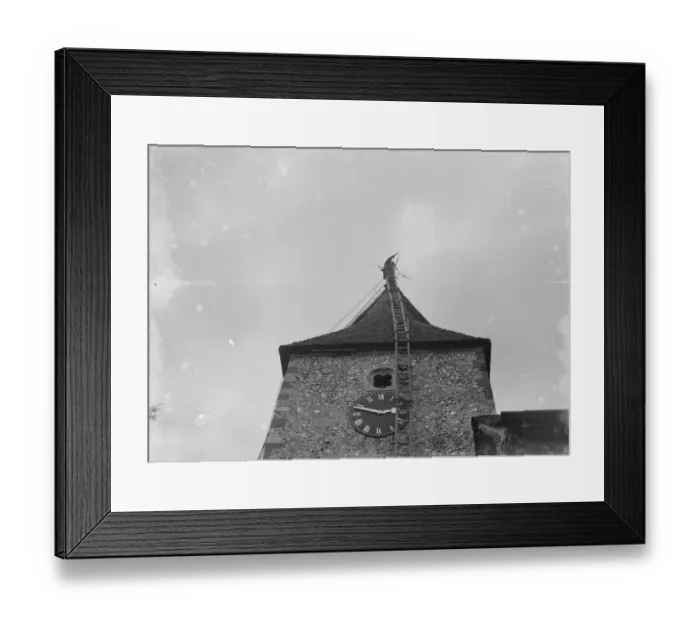 Framed Print : A steeplejack at work on top of St Mary Cray church tower. 1935 Framed Print : A steeplejack at work on top of St Mary Cray church tower. 1935