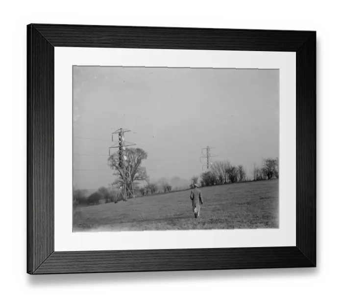 Framed Print : Electricity pylons in Eynsford, Kent. 13 December 1936 Framed Print : Electricity pylons in Eynsford, Kent. 13 December 1936
