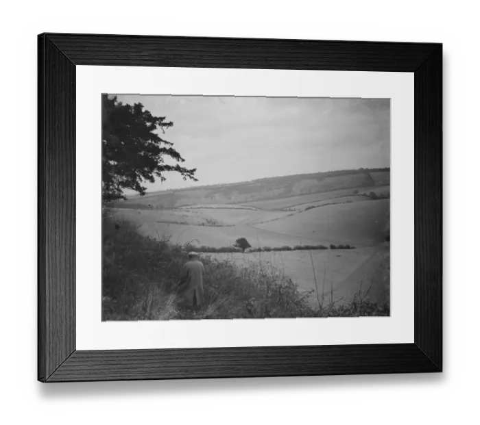 Framed Print : A farmer stands to view his fields at Preston hill farm estate. 3 February 1938 Framed Print : A farmer stands to view his fields at Preston hill farm estate. 3 February 1938