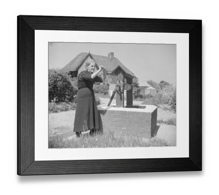 Framed Print : Rebecca Munday using a water well in Deans Bottom, Kent. 1939 Framed Print : Rebecca Munday using a water well in Deans Bottom, Kent. 1939