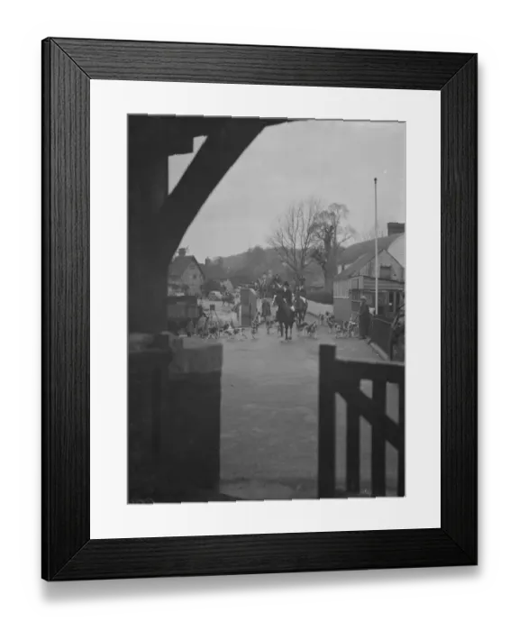Framed Print : The huntsmen and their hounds follow the scent down the road. 31 January1938 Framed Print : The huntsmen and their hounds follow the scent down the road. 31 January1938