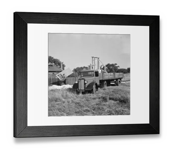 Framed Print : A bedford truck from Austin and Eastham standar joinery, unloads a trailer full