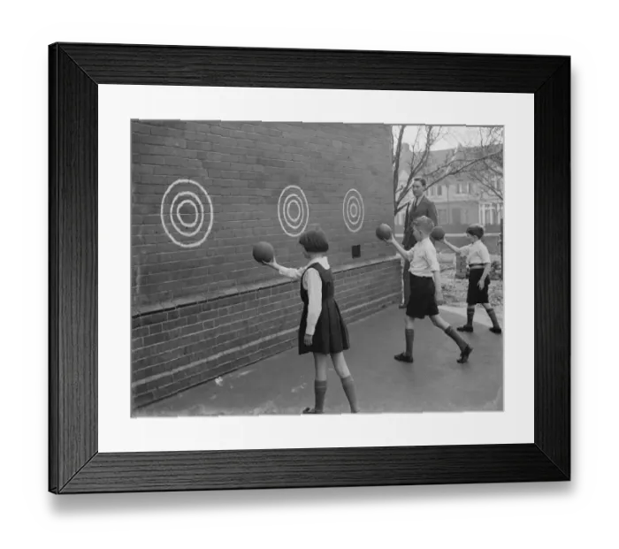 Framed Print : Children play wall ball games at St Mary Cray Council School in Bromley, Kent. 1939 Framed Print : Children play wall ball games at St Mary Cray Council School in Bromley, Kent. 1939