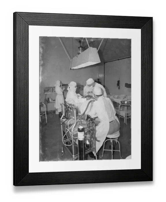 Framed Print : Gravesend Hospital in Kent. Operation underway in the theatre. 1939 Framed Print : Gravesend Hospital in Kent. Operation underway in the theatre. 1939