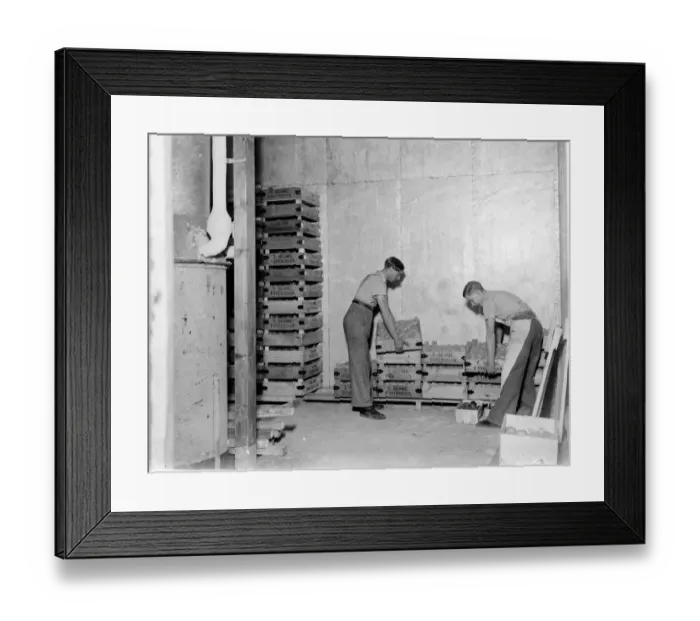 Framed Print : Workers load crates of fruit into cold storage. 1939 Framed Print : Workers load crates of fruit into cold storage. 1939