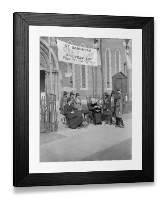 Framed Print : A little girl gives money to the collectors for St Barnabas Church in Eltham, Kent Framed Print : A little girl gives money to the collectors for St Barnabas Church in Eltham, Kent