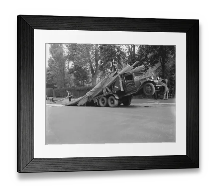 Framed Print : A lorry tips backwards spilling its load in Sevenoaks, Kent. 1935 Framed Print : A lorry tips backwards spilling its load in Sevenoaks, Kent. 1935