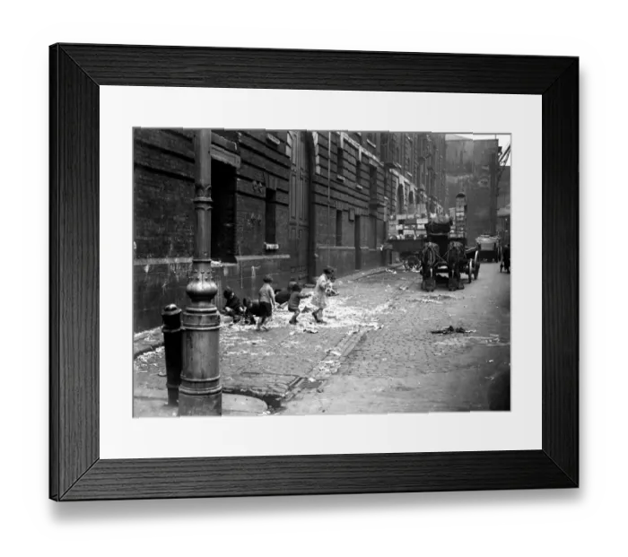 Framed Print : Toddlers & small chidren playing in the street by the docks in London. 1933 Framed Print : Toddlers & small chidren playing in the street by the docks in London. 1933