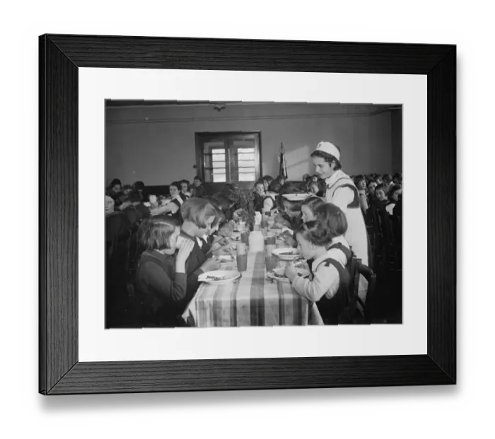 Framed Print : The dinner lady serving lunch at a girls school in Orpington, Kent. 1937 Framed Print : The dinner lady serving lunch at a girls school in Orpington, Kent. 1937