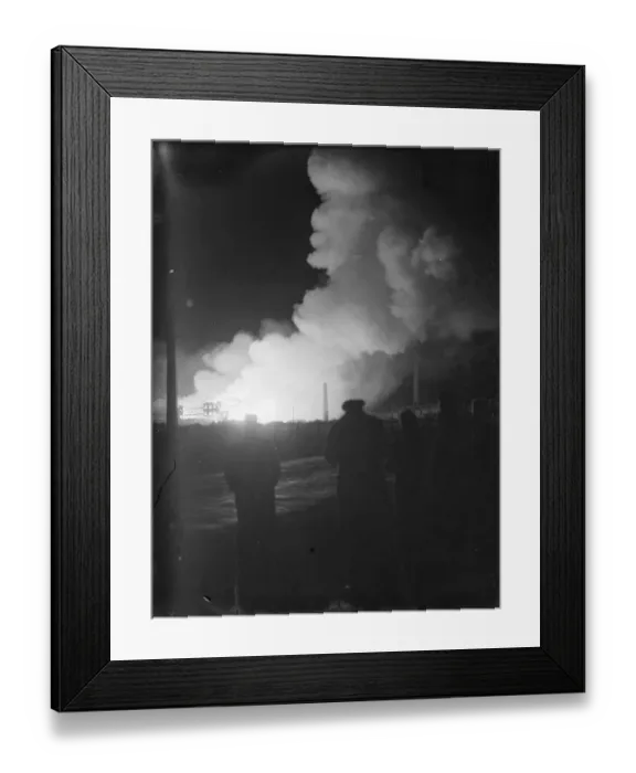 Framed Print : Flames and smoke coming from a fire at the tannery in Dartford, Kent. The silhouetted Framed Print : Flames and smoke coming from a fire at the tannery in Dartford, Kent. The silhouetted