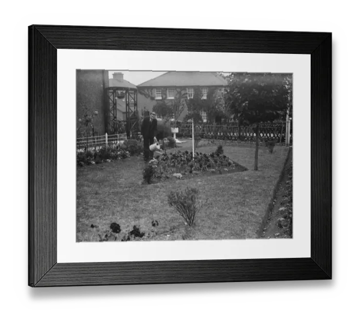 Framed Print : Mr F W Sims stands over his prize garden in Horton Kirby. 1938