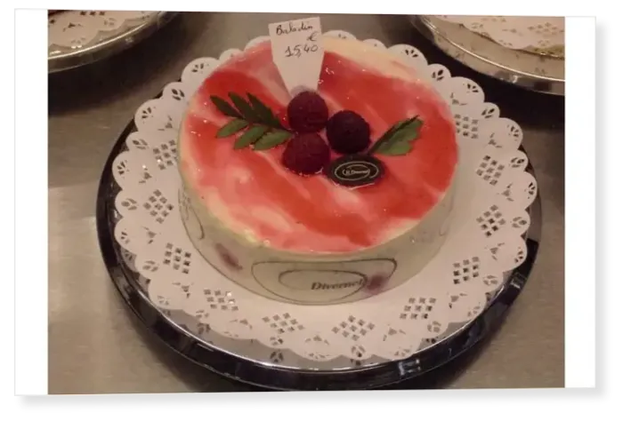 Print : High-class French patisserie displayed on a doily, Dieppe, Seine-Maritime, Normandy