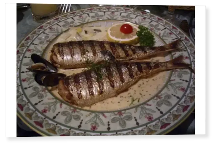Print : Grilled herring served in a sauce on a dinner plate in a restaurant, Dieppe, Seine-Maritime Print : Grilled herring served in a sauce on a dinner plate in a restaurant, Dieppe, Seine-Maritime