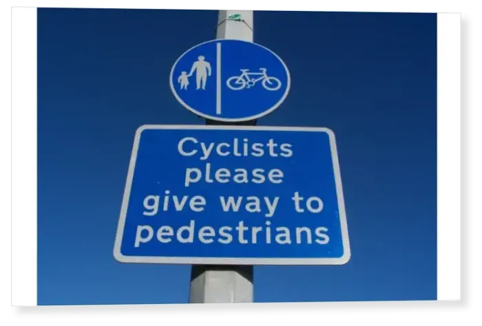 Print : Sign with blue circle indicating segregated pedal cycle and pedestrian route with Print : Sign with blue circle indicating segregated pedal cycle and pedestrian route with