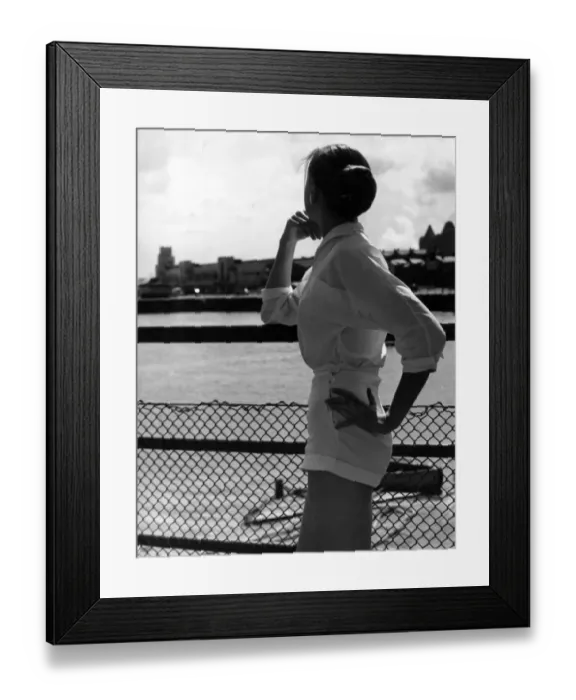 Framed Print : Susan Mann - a woman looking over Marine Lake at New Brighton Framed Print : Susan Mann - a woman looking over Marine Lake at New Brighton