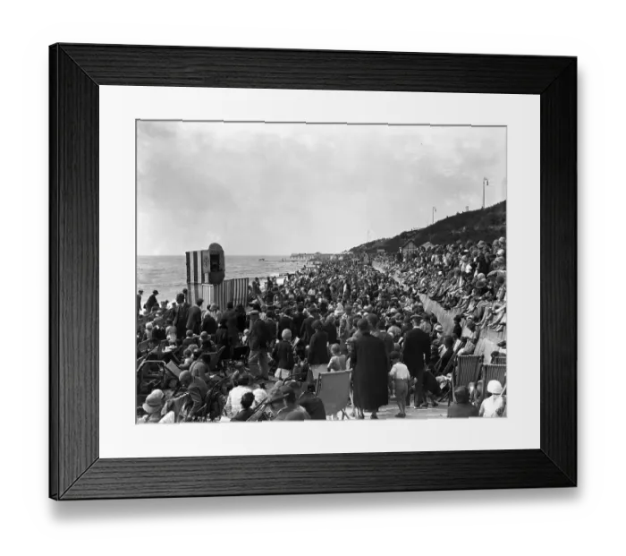 Framed Print : Crowds watch a Punch and Judy show on the beach at Clacton - on - Sea, Essex. 24 Framed Print : Crowds watch a Punch and Judy show on the beach at Clacton - on - Sea, Essex. 24