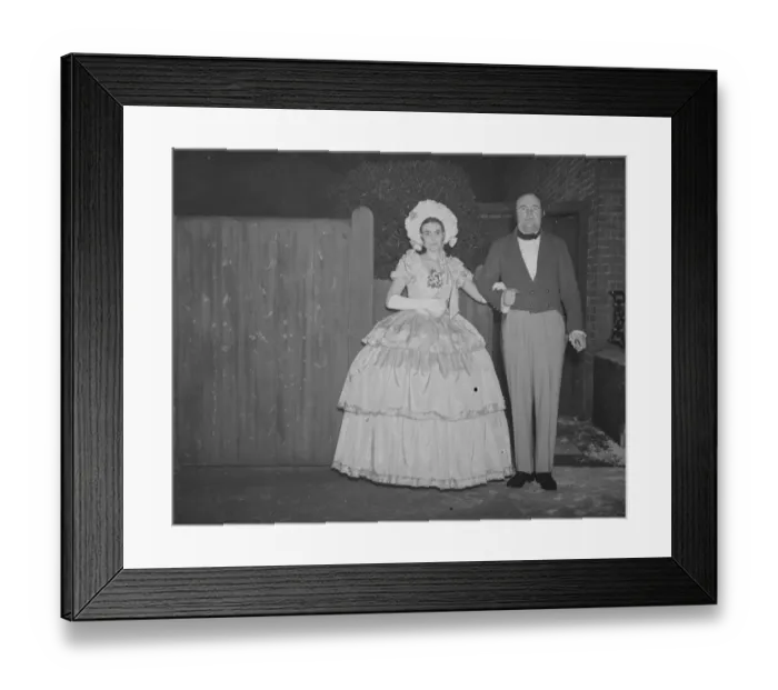 Framed Print : Photographer, Mr John Topham with Miss Haken, dressed in Victorian costume. 1938