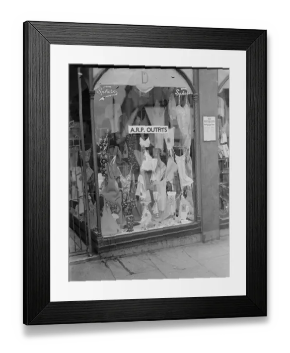 Framed Print : A Dawsons shop front advertising that they have Air Raid Precautions ( ARP ) outfits Framed Print : A Dawsons shop front advertising that they have Air Raid Precautions ( ARP ) outfits
