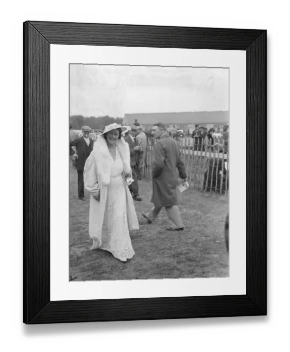 Framed Print : All white at the Derby. A woman Derby spectator in a striking white fashion at Epsom Framed Print : All white at the Derby. A woman Derby spectator in a striking white fashion at Epsom