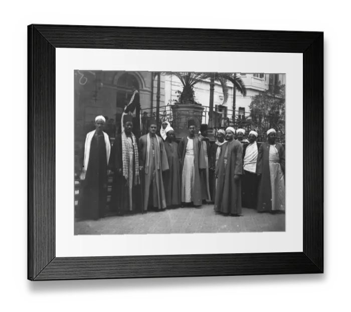 Framed Print : Cairo, Egypt. A picturesque group of Dragomen outside the Shepheard Hotel. February Framed Print : Cairo, Egypt. A picturesque group of Dragomen outside the Shepheard Hotel. February