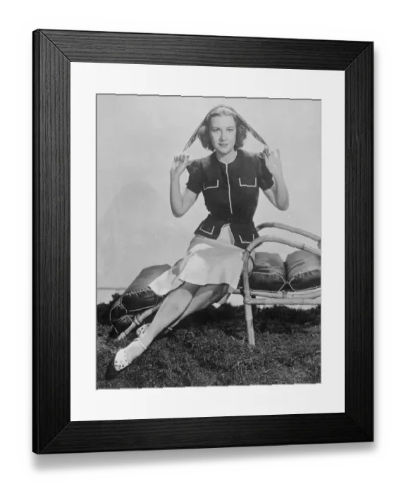Framed Print : The versatile handkerchief. Shirley Ross, the Hollywood film actress, with a gaily Framed Print : The versatile handkerchief. Shirley Ross, the Hollywood film actress, with a gaily