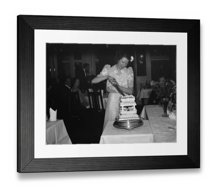Framed Print : Miss Brands party in Southend, Essex. Cutting the cake. 1938 Framed Print : Miss Brands party in Southend, Essex. Cutting the cake. 1938