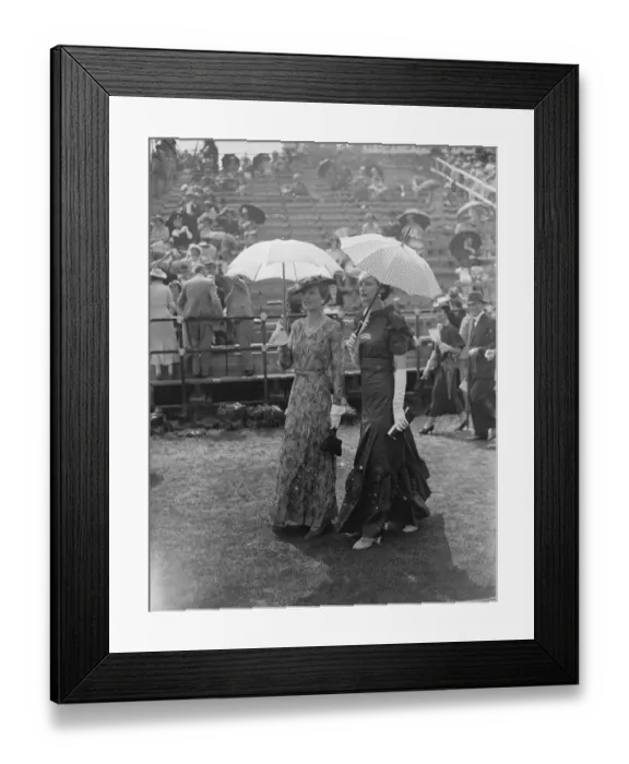 Framed Print : Parasols and fashions at Hurlingham. Two fashionable women spectators at Hurlingham Framed Print : Parasols and fashions at Hurlingham. Two fashionable women spectators at Hurlingham