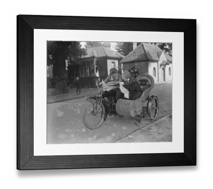 Framed Print : Miss Sybll Arundale and Miss Betty Fairfax out for a motor cycle trip Examining a map Framed Print : Miss Sybll Arundale and Miss Betty Fairfax out for a motor cycle trip Examining a map