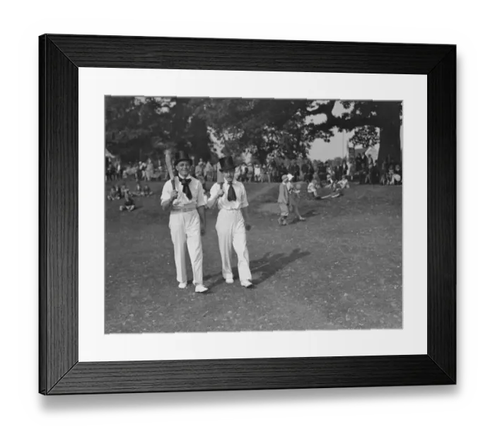 Framed Print : Top hats and side whiskers were worn by players in an old time cricket match between Framed Print : Top hats and side whiskers were worn by players in an old time cricket match between